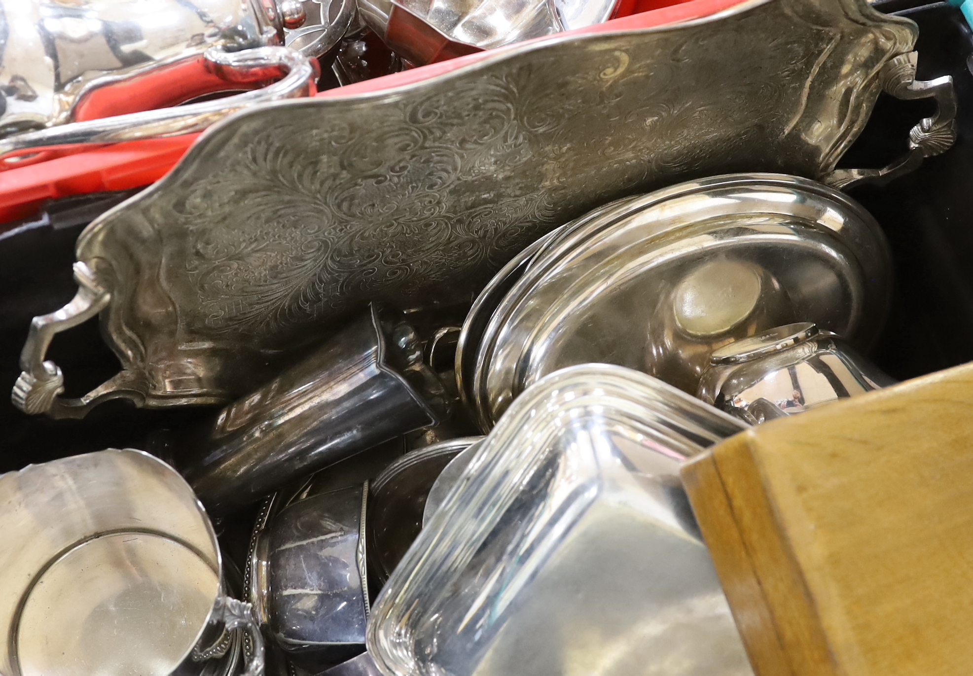 An assortment of silver plated ware including breakfast dishes, oval tray and vases